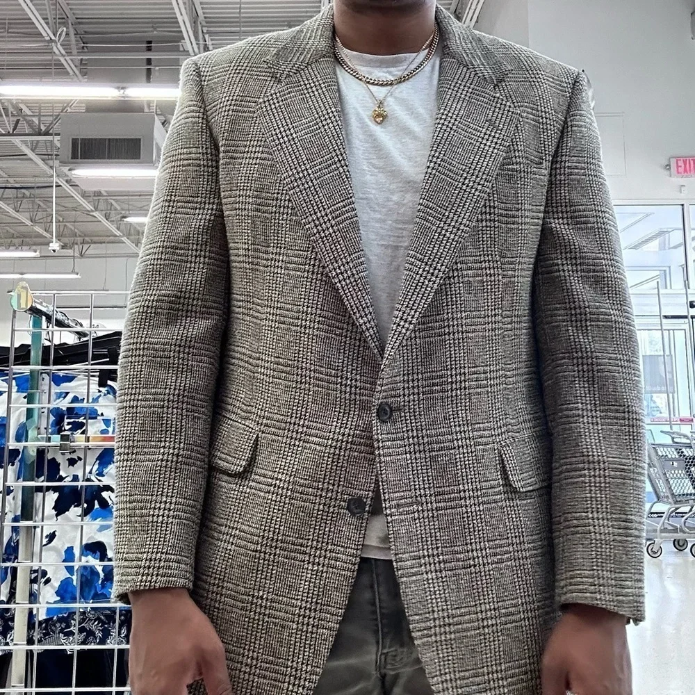 Brand: Corbin Classic brown and gray plaid blazer with a double button closure.